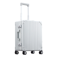 Valise de transport en alliage d'aluminium argenté 2024 avec ceinture rigide, doublure personnalisée, étanche et antichoc, roues disponibles, OEM/ODM disponible