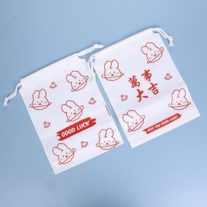 ผ้าเช็ดตัวพิมพ์ลายจากโรงงาน ชุดเสื้อผ้าเด็กแขนสั้นพร้อมครีมกันแดด บรรจุในถุงแบบม้วน - Product Image 6