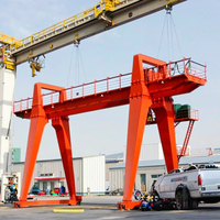 L'usine fournit une grue portique électrique de 25 tonnes avec boîte de vitesses et PLC, hauteur de levage de 12 m, utilisée pour le levage de marchandises.