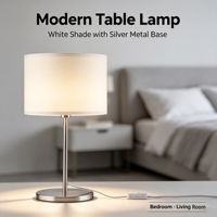 Lampe de table moderne en tissu, avec support en métal nickel brossé et abat-jour cylindrique en tissu crème, idéale pour chambre à coucher et hôtel