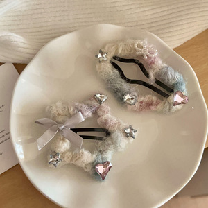A sweet and girly hair <b>clip</b> with a starry cloud pattern, rhinestone <b>bow</b>, and fluffy texture, perfect for the forehead, bangs, - Product Image 1