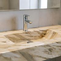 Marbre beige doux et confortable, idéal pour les revêtements de sol résidentiels chaleureux, les suites de chambre et les intérieurs lumineux des salles familiales.