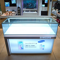Vitrine d'exposition personnalisée en métal et verre avec éclairage LED pour produits électroniques et téléphones portables – Vitrines sur mesure