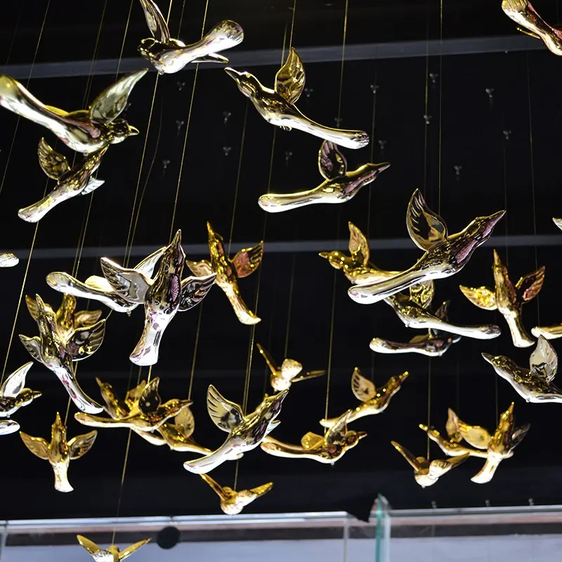 Decoración creativa caliente Pájaro de cristal colgando en el cielo Candelabro de cristal de pájaro
