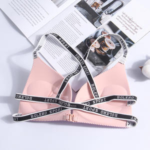 Sujetador deportivo sin costuras para mujer, de talle bajo, push-up, transpirable, con tirantes cruzados en la espalda y diseño de espalda cruzada, con letras en inglés. - Product Image 2