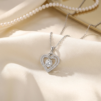 Nouveau collier pendentif cœur en moissanite taille brillant ronde 6,5 mm 1 carat en argent sterling 925 pour femme, bijoux certifiés GRA