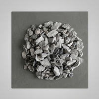 Carbure de calcium CAS 75-20-7 50-80mm Qualité industrielle Pureté 85%-95% Granulés gris/noirs Rendement en gaz 295L/kg pour acétylène