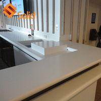 Station d'infirmière blanche de luxe en pierre de résine de surface solide comptoir de réception de salon de beauté d'hôtel de conception moderne