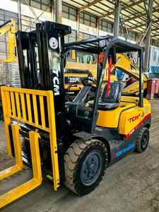 Carretilla elevadora diésel de combustión interna usada TCM 3Ton con neumático sólido y mástil de tres etapas - Product Image 3