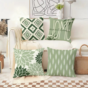Những chiếc gối có họa tiết màu xanh lá cây ấm cúng trang trí phòng khách trong dịp lễ hội, cùng với những chiếc tất Giáng sinh và những chiếc gạc tuần lộc. - Product Image 2