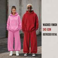 Ensemble streetwear homme : sweat à capuche oversize style rétro délavé et pantalon de survêtement ample patchwork, style hip-hop vintage
