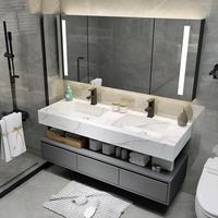 Meuble-lavabo double vasque mural avec finition en marbre gris, doté d'une vasque en céramique avec rangement, adapté aux hôtels