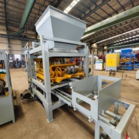 Machine de production de blocs hydrauliques QT4-15 pour matériaux de construction