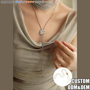 CAIOOCHE Collier long en acier inoxydable avec pendentif cœur, chaîne dorsale à pampilles, design géométrique minimaliste et chaîne réglable, Bijoux - Product Image 1