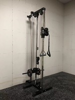 Machine à tirer vers le bas de poulie de câble de rangée de lat fixée au mur réglable bon marché Machine à tirer vers le bas de câble croisé simple pour l'équipement à la maison de gymnastique