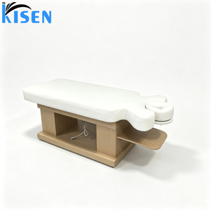 Le lit de massage électrique de style thaïlandais Kisen est doté d'un cuir de qualité supérieure et d'une base en bois réglable, adapté aux massages du visage et du corps. - Product Image 3