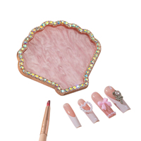 Palette de présentation en alliage doré en forme de coquille avec strass pour le mélange de vernis à ongles et la présentation des faux ongles