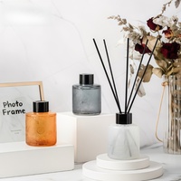 Diffuseur de roseaux haut de gamme personnalisé ambre 200ml diffuseur d'huile essentielle naturelle dans une bouteille en verre diffuseur de roseaux avec bâton
