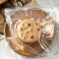 Balle anti-stress souple en forme de biscuit, jouet sensoriel TPR à remontée lente, biscuit sandwich réaliste à presser pour la décompression des adultes sur le bureau