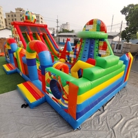 Parc de jeux gonflable coloré 14MX7M avec toboggan, parcours d'obstacles, terrain de jeux Yuedong, château en PVC