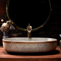 Jingdezhen Cerámica Arte Oem & Odm Hotel Moderno Fregadero Lavabo Setaria Patrón Forma ovalada Fregaderos de baño para la venta