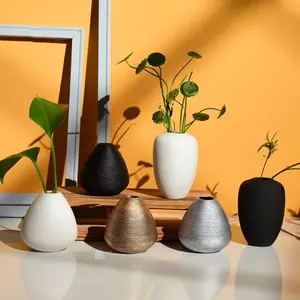 Yeni tasarım siyah beyaz seramik çiçek vazo bitki el yapımı sanat porselen vazolar dekorasyon için ev