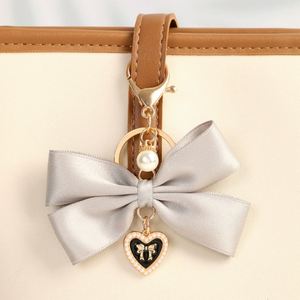 Porte-clés élégant en gros avec nœud papillon, magnifique breloque créative, pendentif souple pour sac, cadeaux de festival pour femmes - Product Image 4