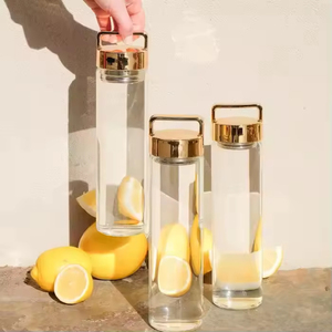 Bouteille d'eau en verre de haute qualité 500 ml avec logo, nouvelle bouteille d'eau en verre avec couvercle doré - Product Image 1