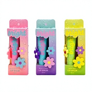 Emballage de tube de baume à lèvres en plastique brillant avec breloque florale - Product Image 1