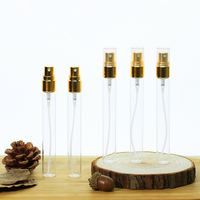 Emballage de soins de la peau de luxe Petites bouteilles en verre avec pulvérisateur en plastique doré 2ml 3ml 5ml 10ml Bouteille de parfum ronde