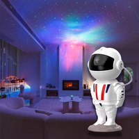 Projecteur Astronaute Robot Veilleuse 16 Couleurs Télécommande Lampe de Projection Étoilée Grande Lampe de Table pour Enfants Cadeau Décoration de Chambre