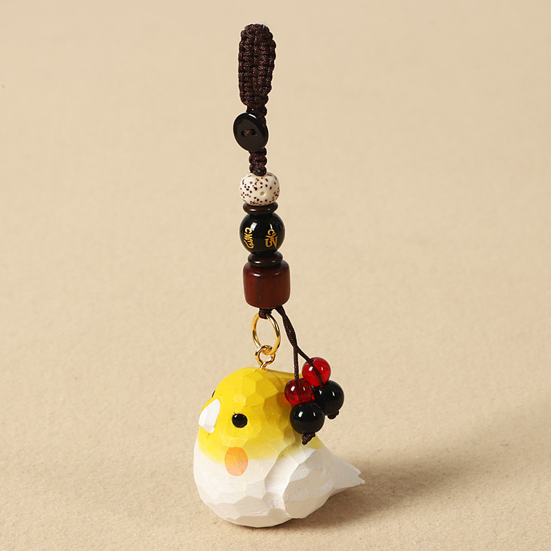Wood-carved white cockatiel-six-character mantra design