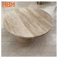 Table basse moderne en travertin sculpté avec pieds en pierre, finition polie, taille personnalisable, garantie 3 ans, pour salon, hôtel, villa
