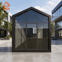 Maison préfabriquée verre avec panneaux sandwich en grain de bois, maison conteneur détachable prête à l'emploi pour le bureau