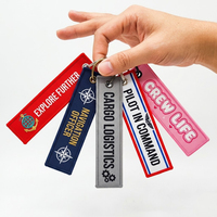 Porte-clés personnalisé en polyester avec étiquette tissée brodée, anneau en tissu, étiquette brodée « Remove Before Fly »