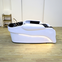 Chaise de massage multifonctionnelle moderne pour salon de coiffure avec lumière LED et lavabo en céramique pour salon de coiffure