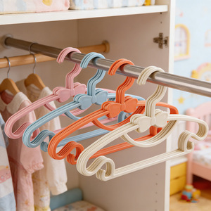 Children's Plastic Clothes Hangers With Bow Design For Kids And Toddlers Simple Trouser Hangers In Blue Pink Orange Off White - Product Image 1