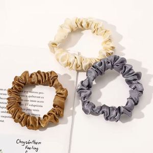 ยางรัดผมผ้าซาตินสีพื้นขนาดเล็ก 1.5 ซม. แบบบาง - Product Image 4