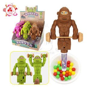 Cara divertida que cambia gorila levantamiento de pesas mancuerna juguete caramelo - Product Image 1