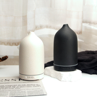 Diffuseur d'huiles essentielles en céramique de luxe, humidificateur ultrasonique aromatique avec lumière LED colorée, décoration moderne pour la maison, cadeau pour le salon