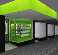 Aménagement de magasin de vente au détail, design de boutique électronique, peinture verte, présentoir intérieur pour accessoires de téléphonie mobile avec comptoir en verre