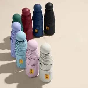 Voyage coloré mignon pliant la petite poche de capsule badine les mini parapluies extérieurs avec le logo