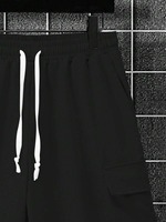 Conjunto de camiseta y pantalones cortos de algodón negro para hombre, cuello redondo, manga corta, color sólido, transpirable.