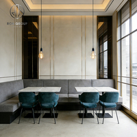 Ensemble de mobilier pour restaurant : banquette demi-cercle incurvée, canapé et table pour café