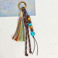 Porte-clés vintage bohème 2026 avec pendentif à pompon, perles et macramé fait main en plastique tressé, pour sac