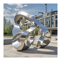 Grande sculpture d'art en acier inoxydable avec base noire, sculpture abstraite en métal de luxe pour la décoration de jardin