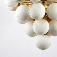 Lustre élégant de style mi-siècle en albâtre, forme globe, luminaire suspendu à plusieurs niveaux pour salle à manger, salon, îlot de cuisine