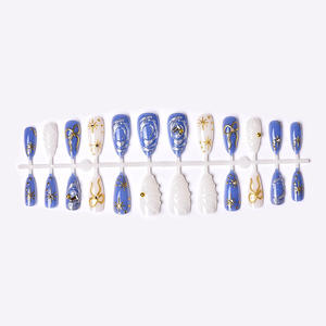 24 faux ongles amande plaqués or faits main, style INS, avec étoiles 3D, nœuds et strass à coller pour manucure - Product Image 5