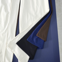 Ensemble deux pièces imprimé pois de créateur, haut à manches longues et épaules dénudées, pantalon évasé à jambes larges contrastant, tailles XS-XL, prêt à expédier