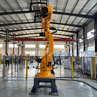 Bras de robot industriel à 6 axes avec une charge utile de 130 kg pour la manutention et la palettisation de matériaux lourds